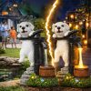 Dekoratívna solárna LED záhradná lampa v tvare psíka